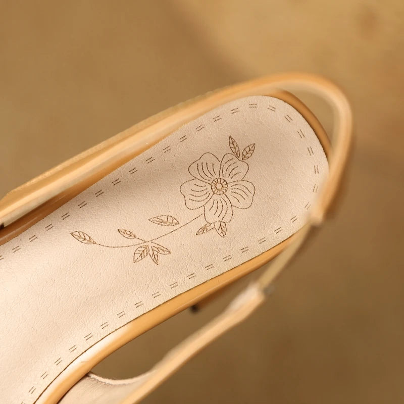 Apricot patent leather slingback block heels, heel detail close-up