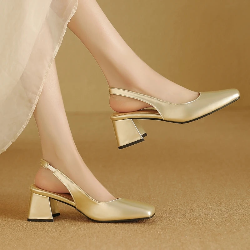 Apricot patent leather slingback shoes with low block heel, angled view
