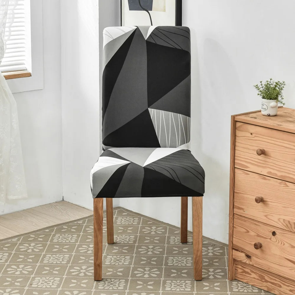 Black and white abstract triangle pattern chair cover in Scandinavian-style interior