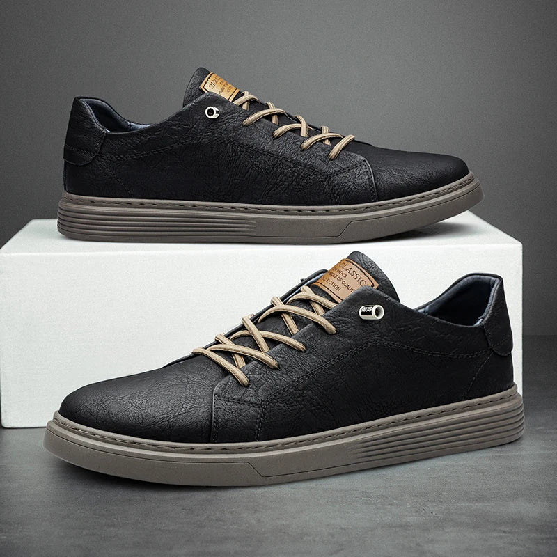 Black genuine leather oxford sneakers with grey outsole on display stand, side view