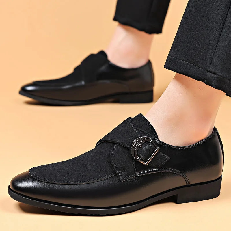 Black men’s leather loafers styled on model with formal pants