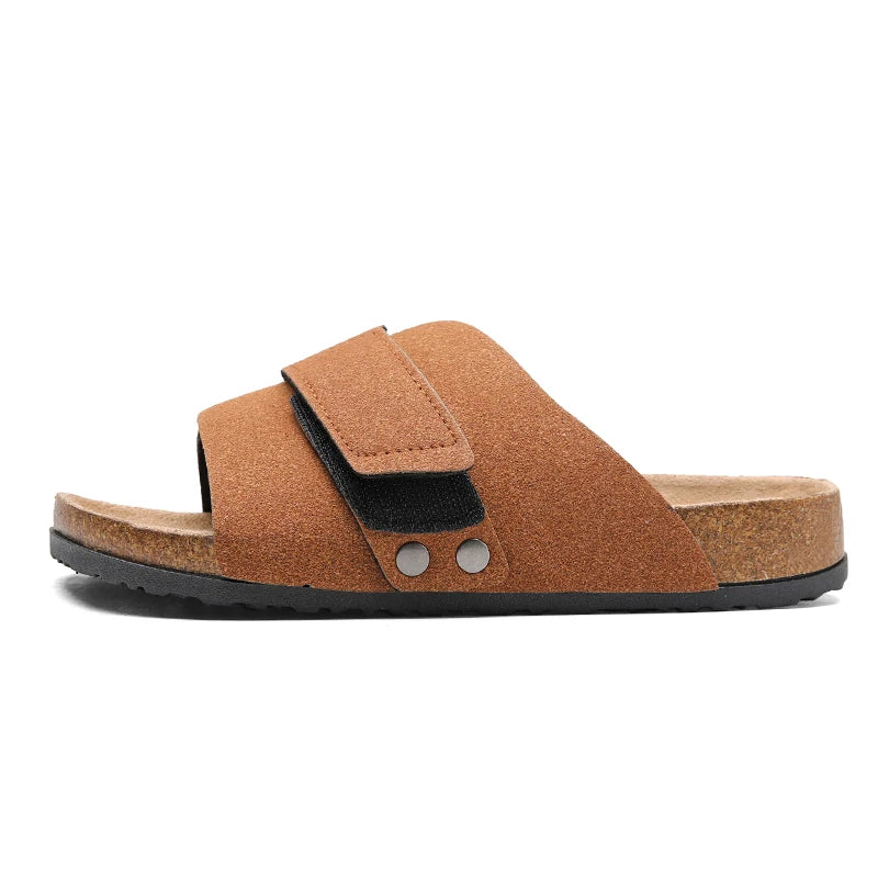 Black suede sandal side profile with thick textured sole