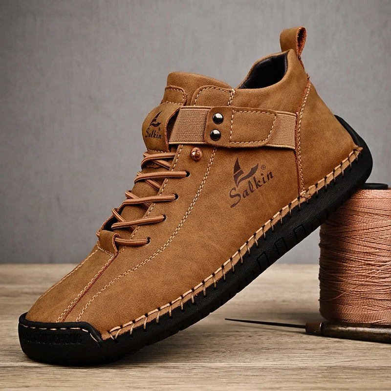 Brown leather ankle sneakers with slip-on elastic collar and detailed stitching