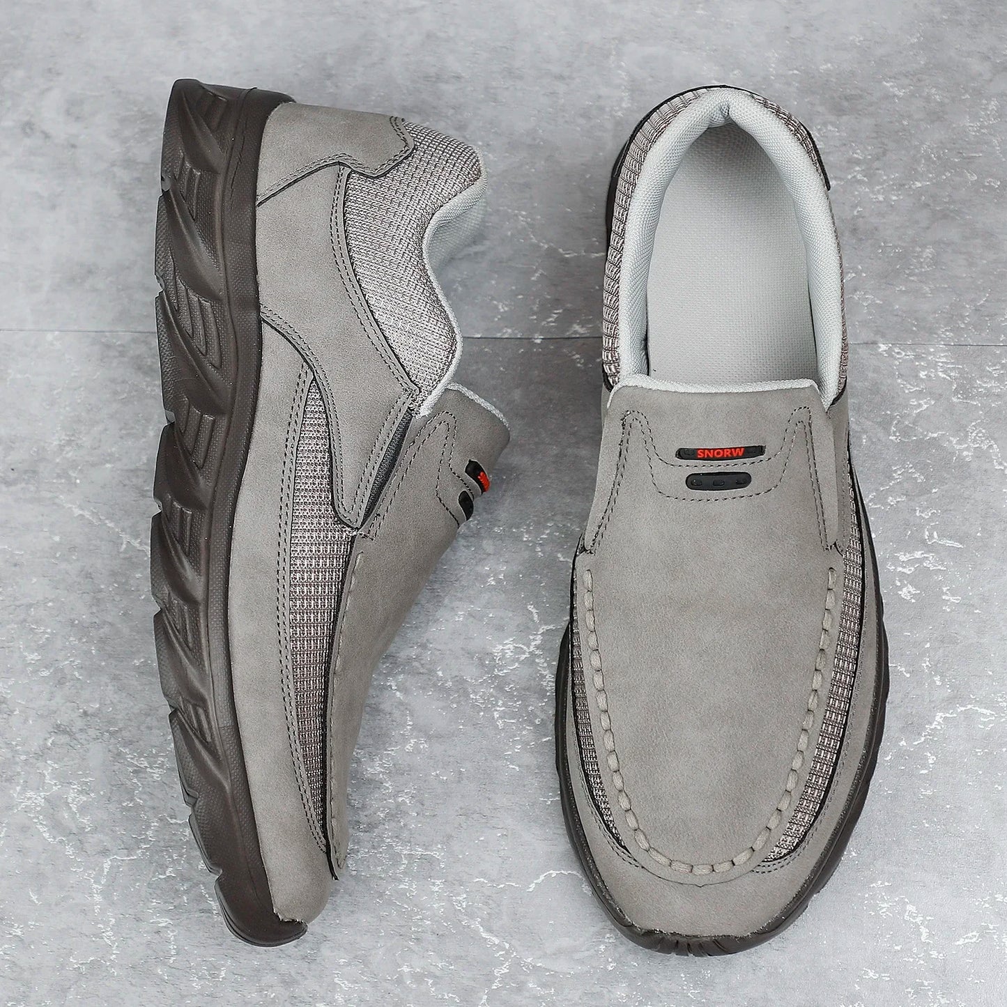 Charcoal grey leather loafers for men with breathable mesh accents, top-down product display