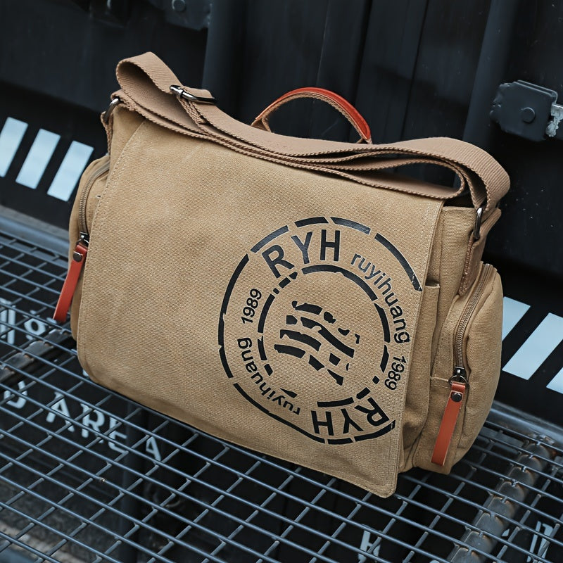 Close-up of Montero Milan canvas messenger bag showing large front print