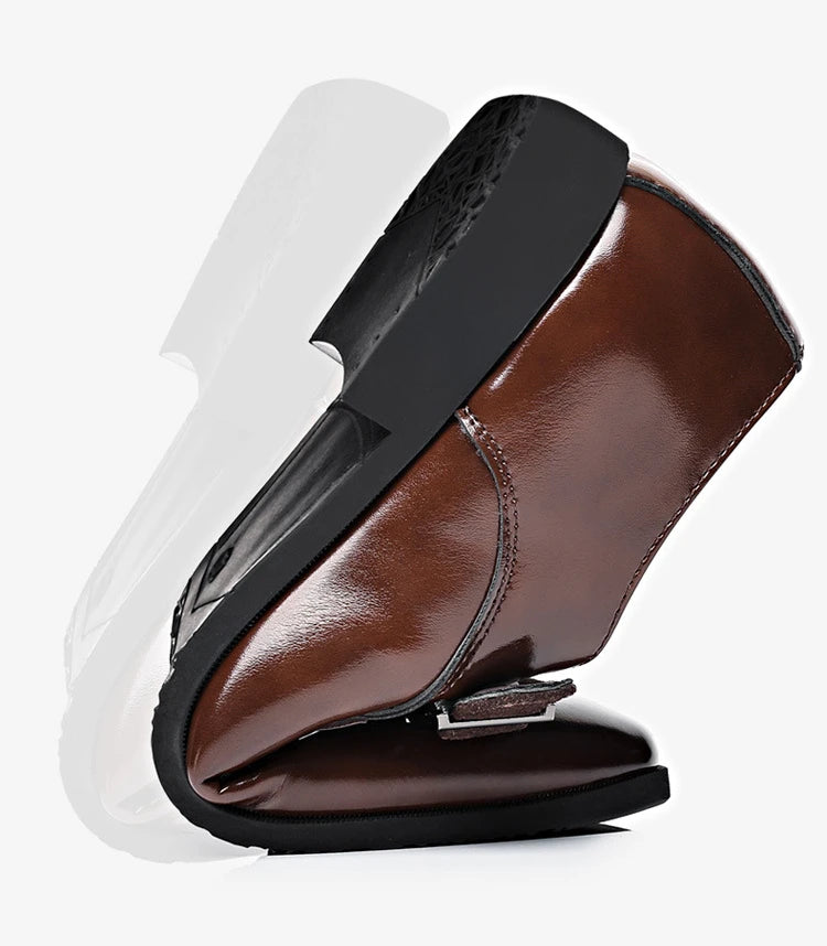 Close-up of brown men’s leather loafers upper texture and detailing