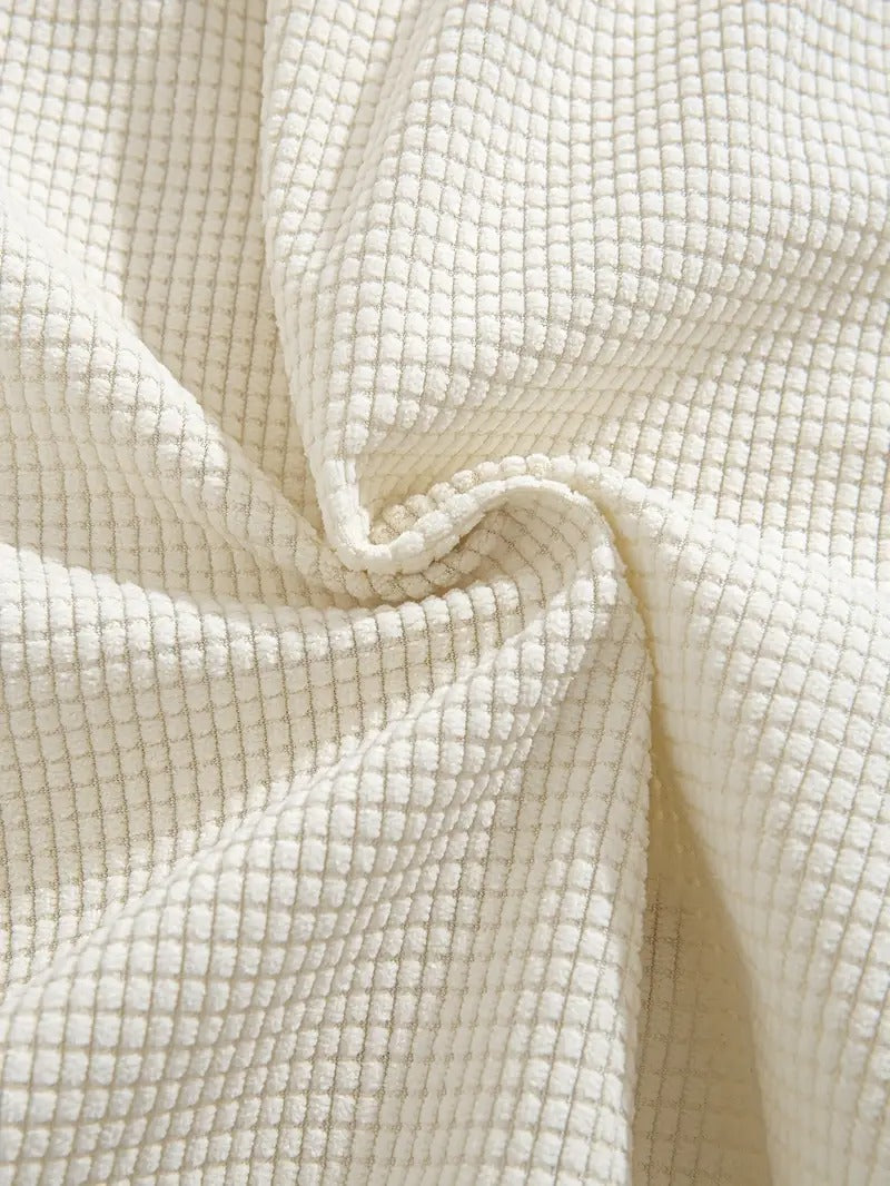 Cream textured drawstring casual shorts, close-up of fabric texture