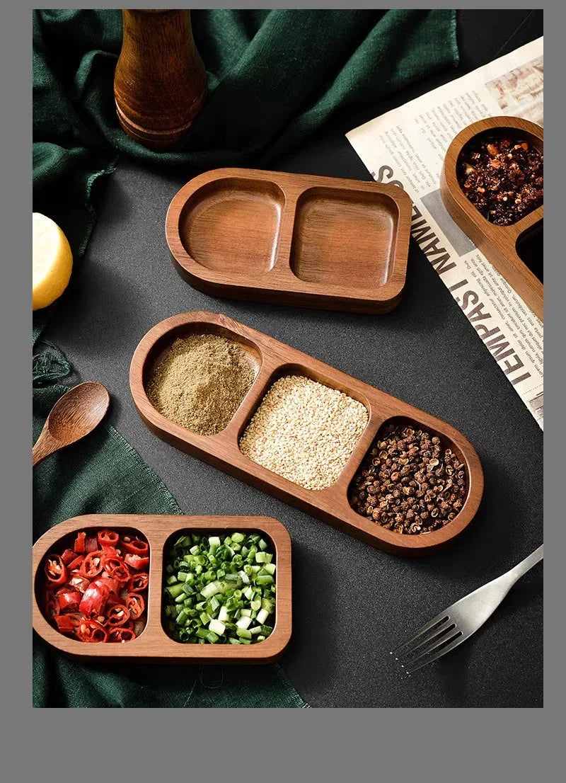 Dark background showing empty and filled condiment trays on textured surface