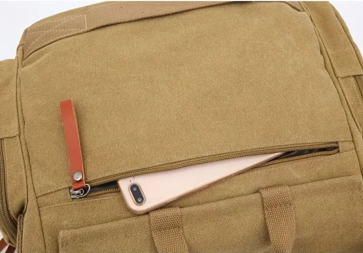 Flat side view of Montero Milan canvas messenger bag