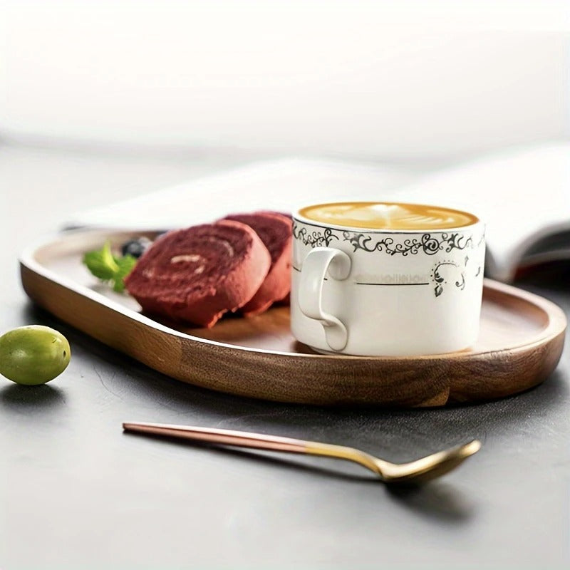 Latte and chocolate roll cake served on walnut Mokura tray with white floral teacup