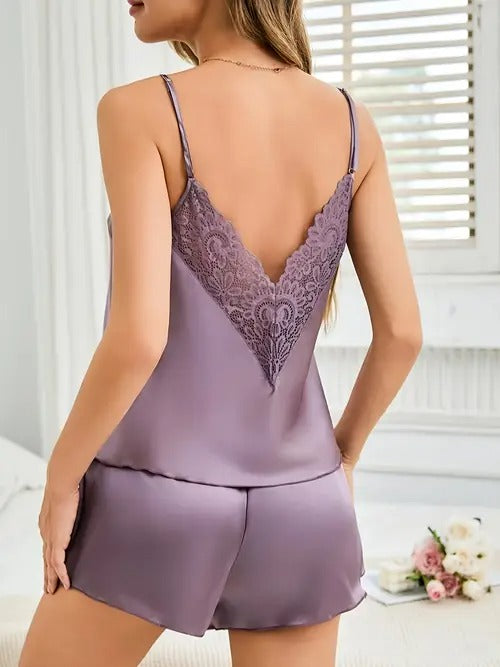 Lavender satin pajama set with lace shorts, standing back view