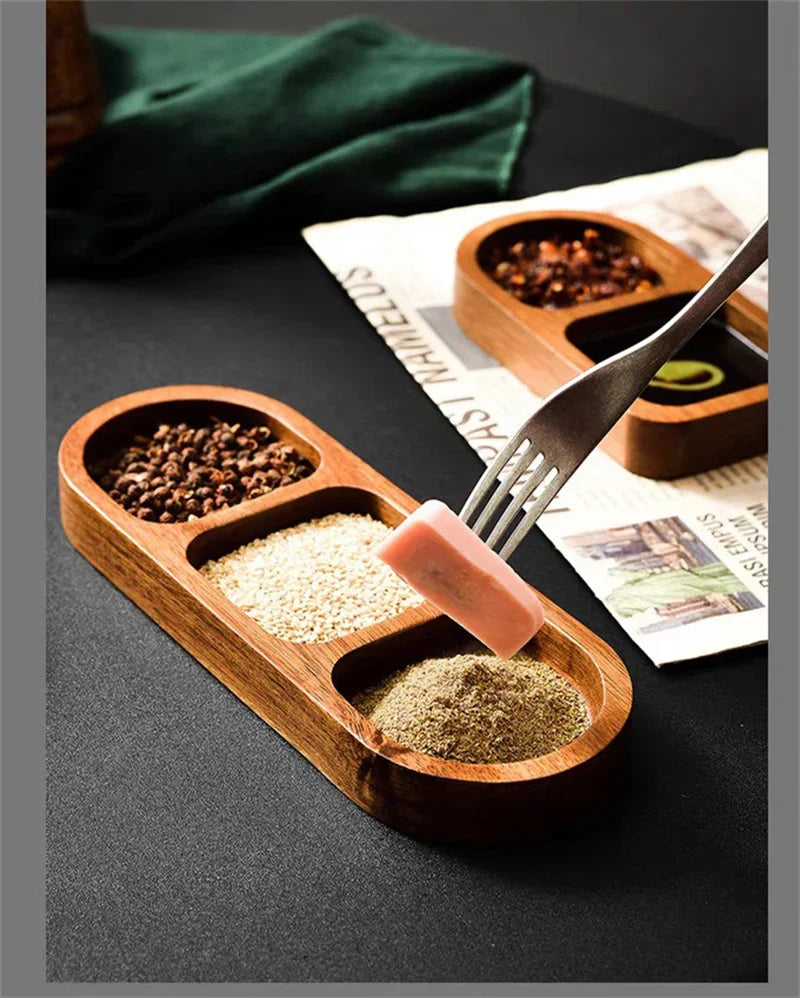 Model holding two wooden divided trays with condiments in each section