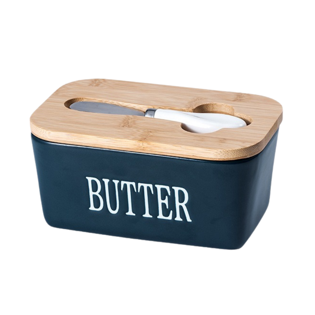 Navy blue ceramic butter dish with bamboo lid and spreader, front display