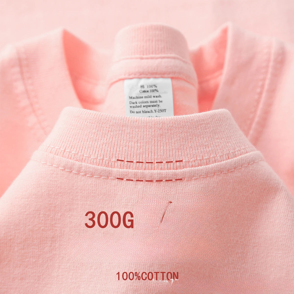 Pink 300g heavyweight cotton T-shirt close-up, neckline and tag detail