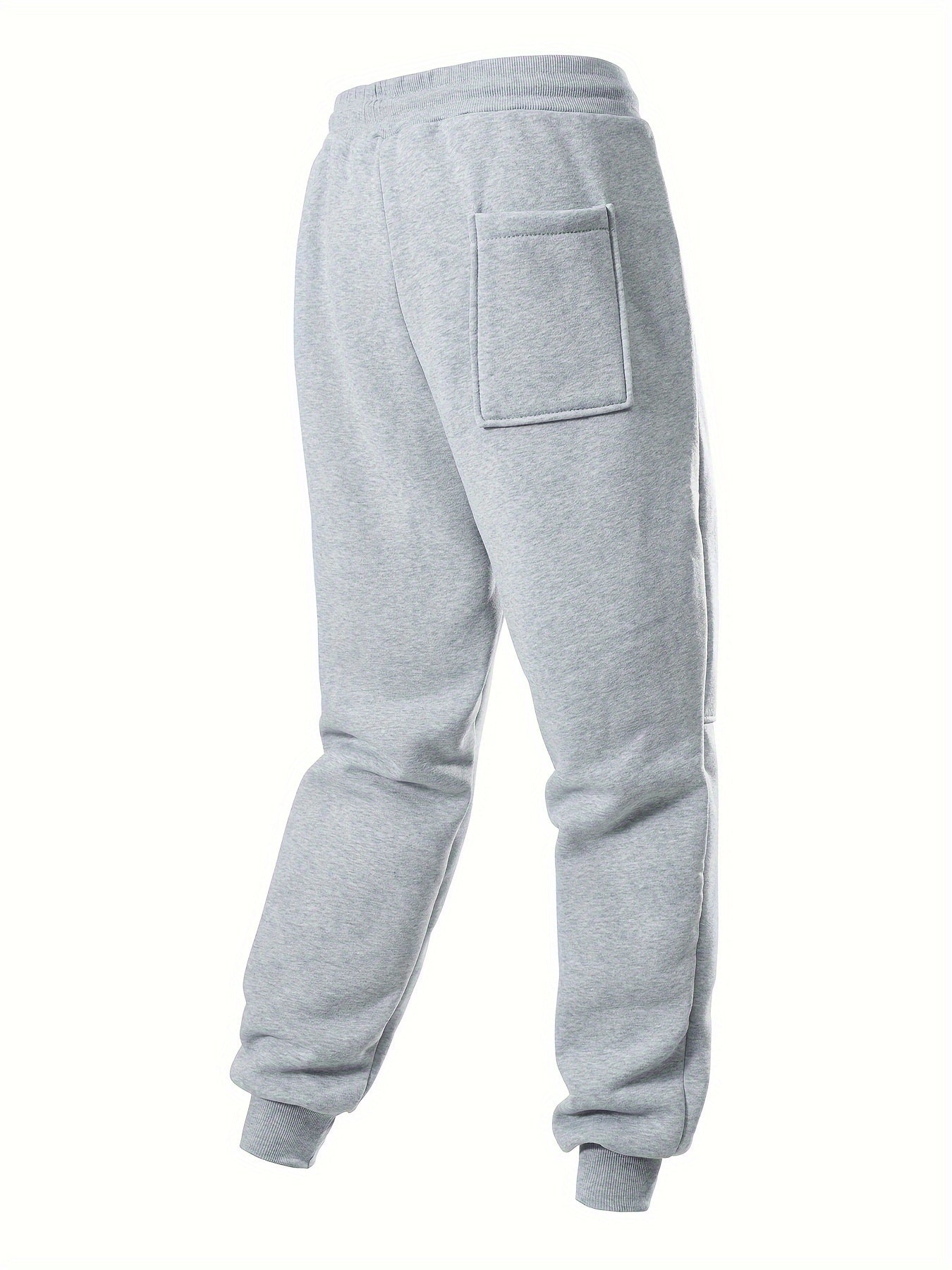 Rear view of light grey jogger sweatpants showing back pocket