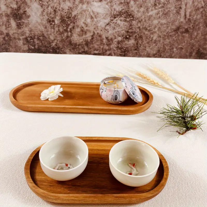 Restaurant dining setup featuring wooden interiors and inset image of Mokura tray with spoon