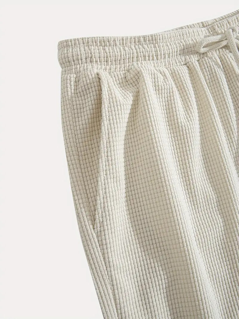 Size chart for textured drawstring casual shorts