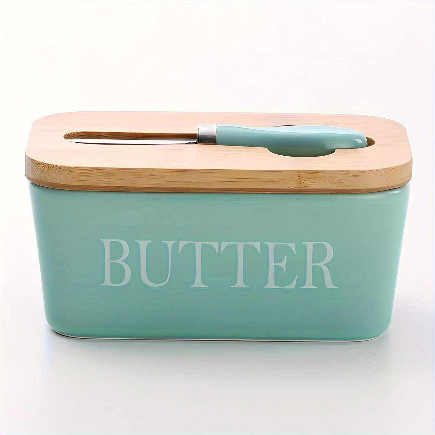 Teal ceramic butter dish with bamboo lid and stainless steel knife
