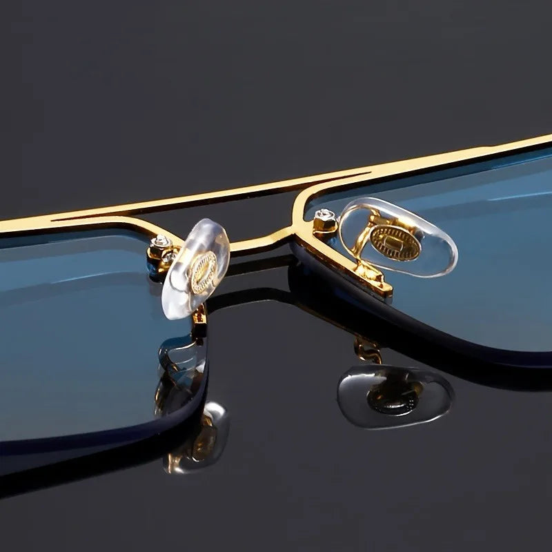 Top-down view of frameless sunglasses with gold temples and wooden grain arms in two colorways