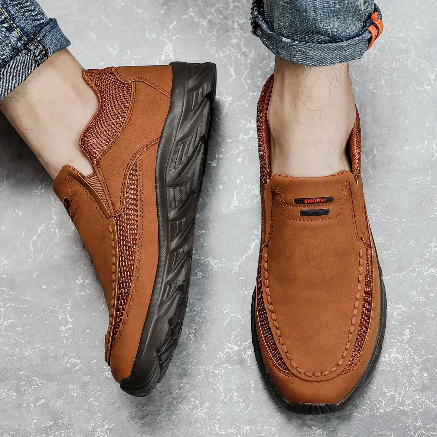 Top view of slip-on brown leather casual shoes with visible insole padding