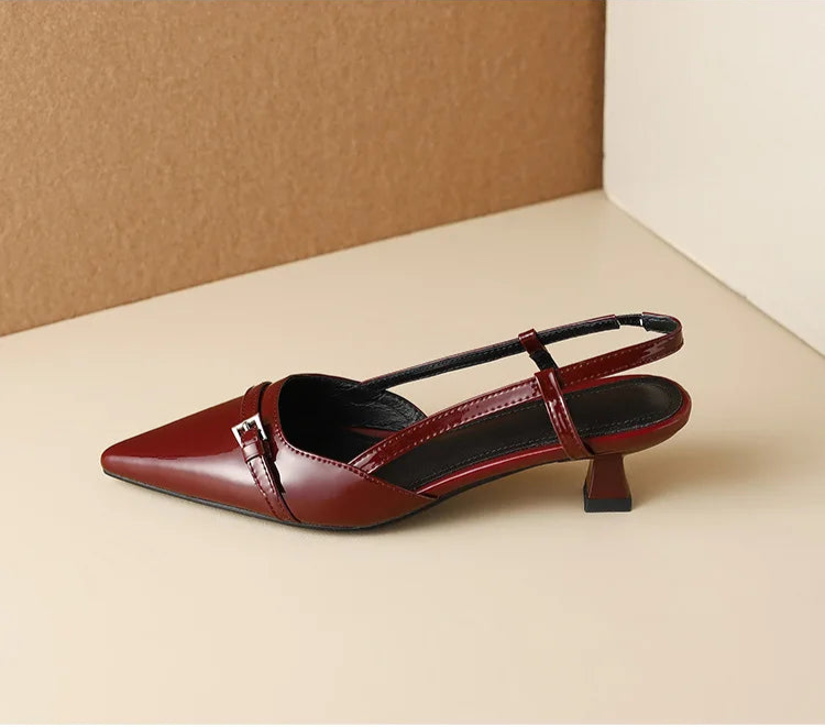 Wine red patent slingback heel, side profile close-up