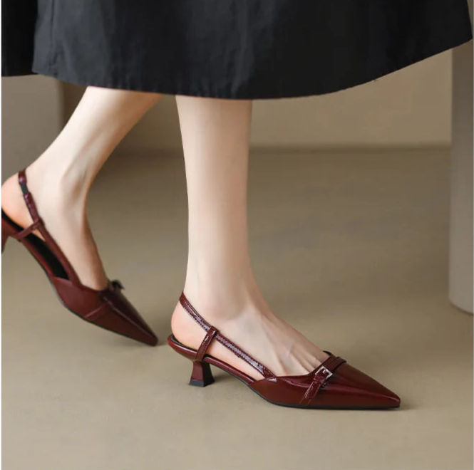 Wine red slingback heels with pointed toe and mid heel,
