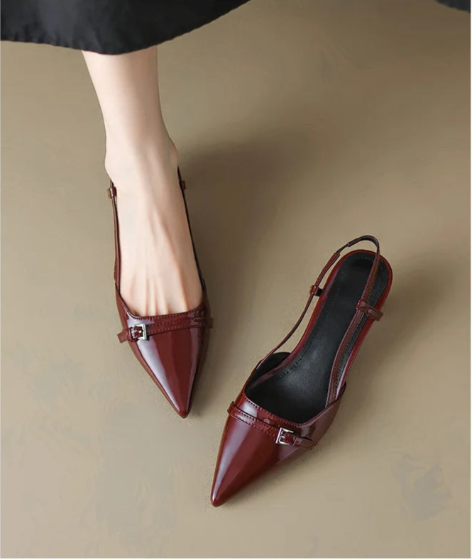 Wine red slingback heels with pointed toe and mid heel, side walking view