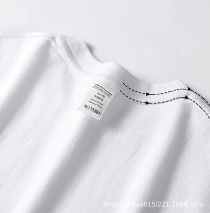 Back label and shoulder seam detail on white heavyweight T-shirt
