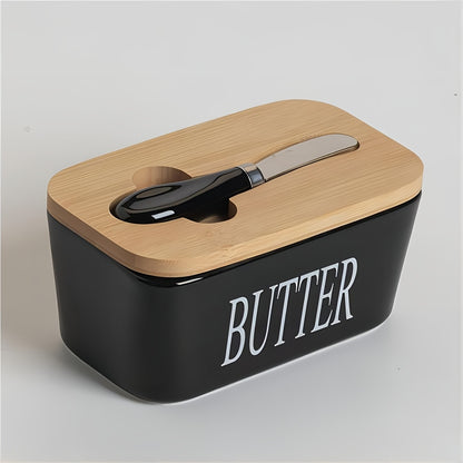 Black ceramic butter dish with bamboo lid and stainless steel spreader
