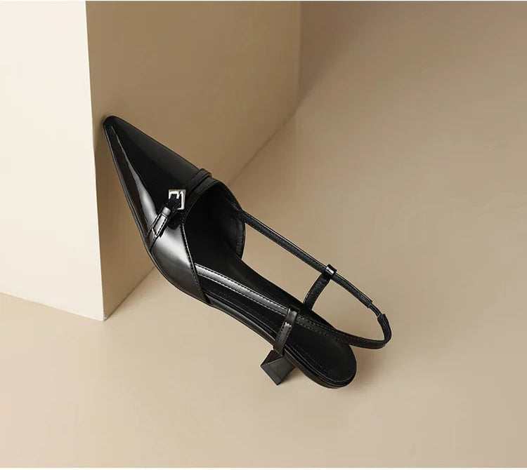 Black patent slingback heel, side view