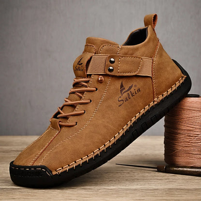 Brown leather ankle sneakers with slip-on elastic collar and detailed stitching