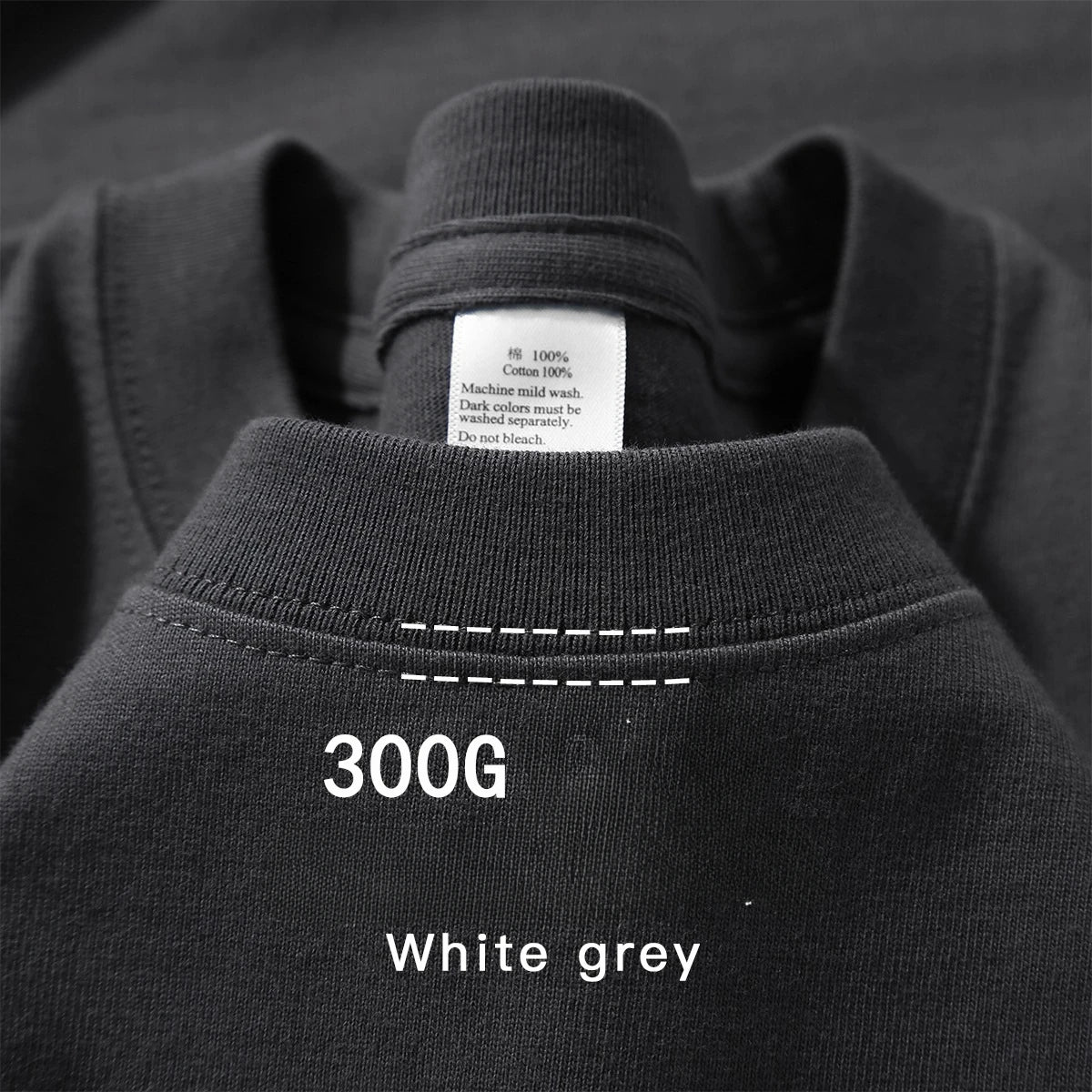 Charcoal grey cotton T-shirt with white contrast stitching and inner label