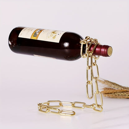 Chrome and gold chain wine holders displayed with bottles on light background