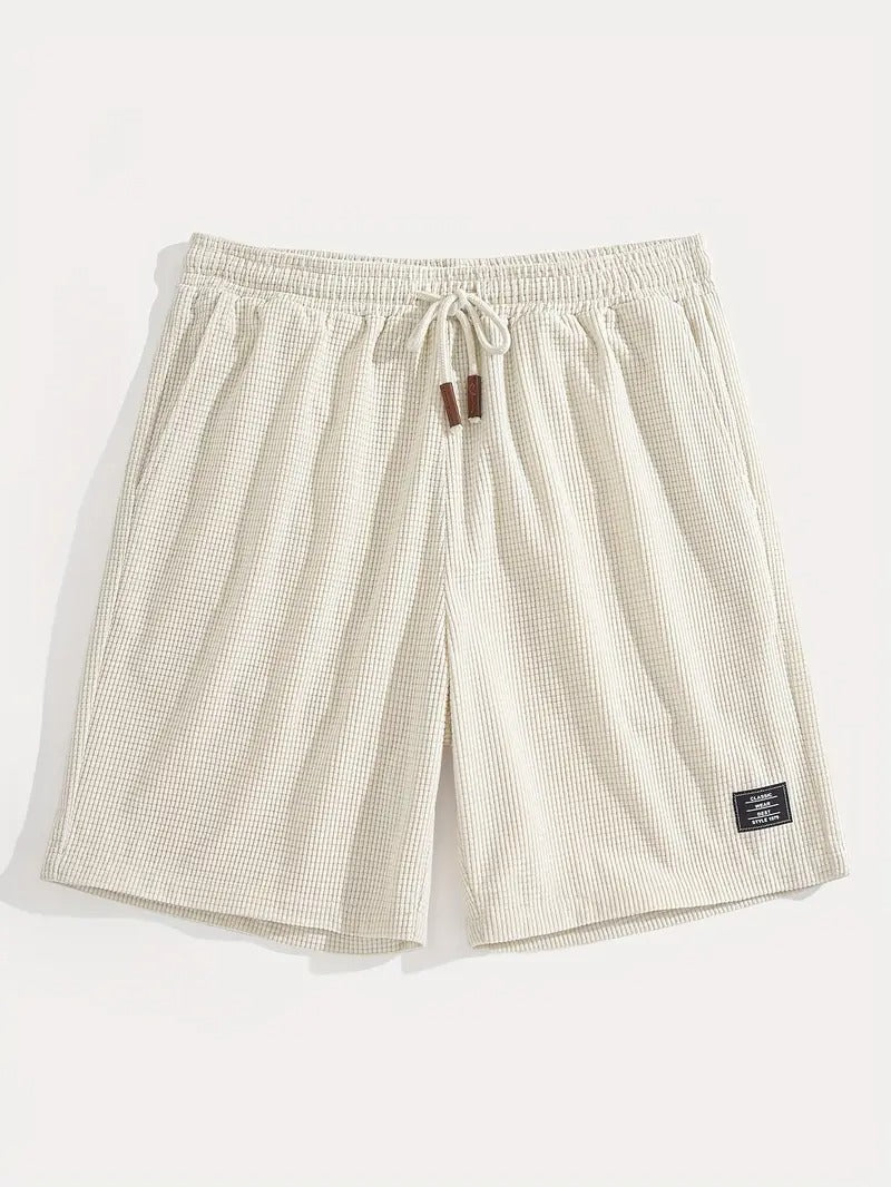 Flat lay of cream textured drawstring casual shorts, front and back view side by side