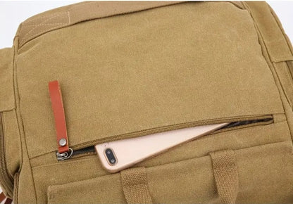 Flat side view of Montero Milan canvas messenger bag