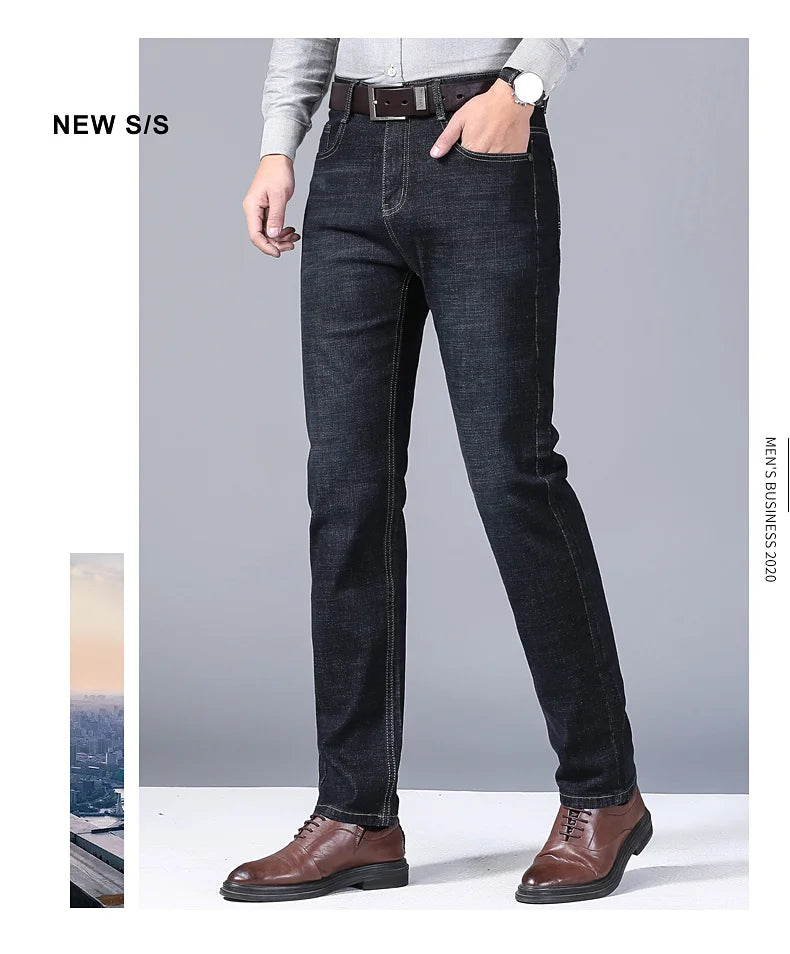 Full front view of black denim jeans on male model styled for business casual

