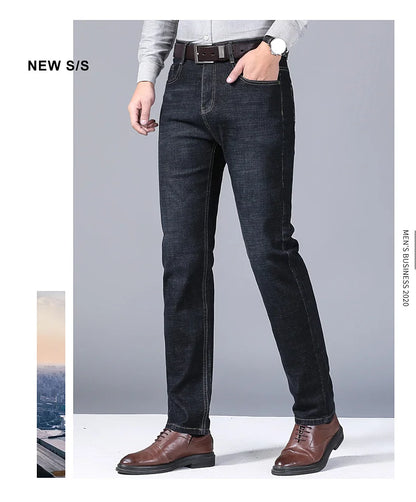 Full front view of black denim jeans on male model styled for business casual

