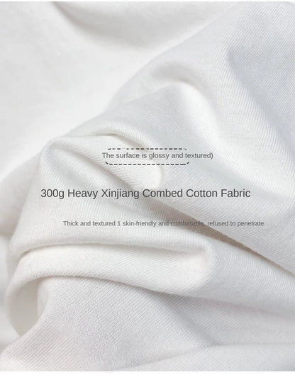 Glossy textured surface of heavyweight combed cotton fabric in whit