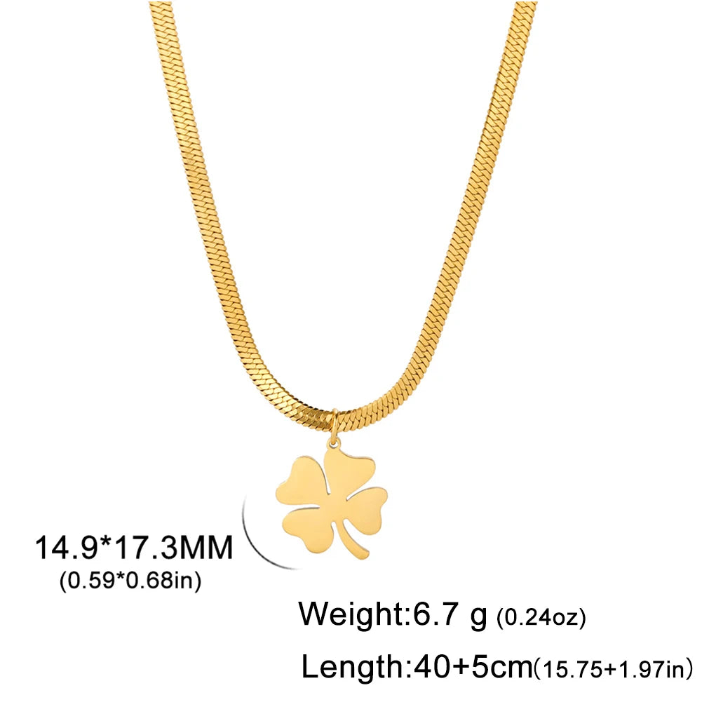Gold clover pendant necklace with size and weight dimensions on white background