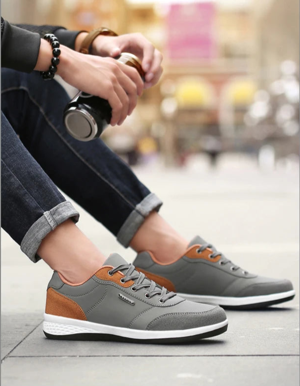 Grey and orange walking sneaker 
