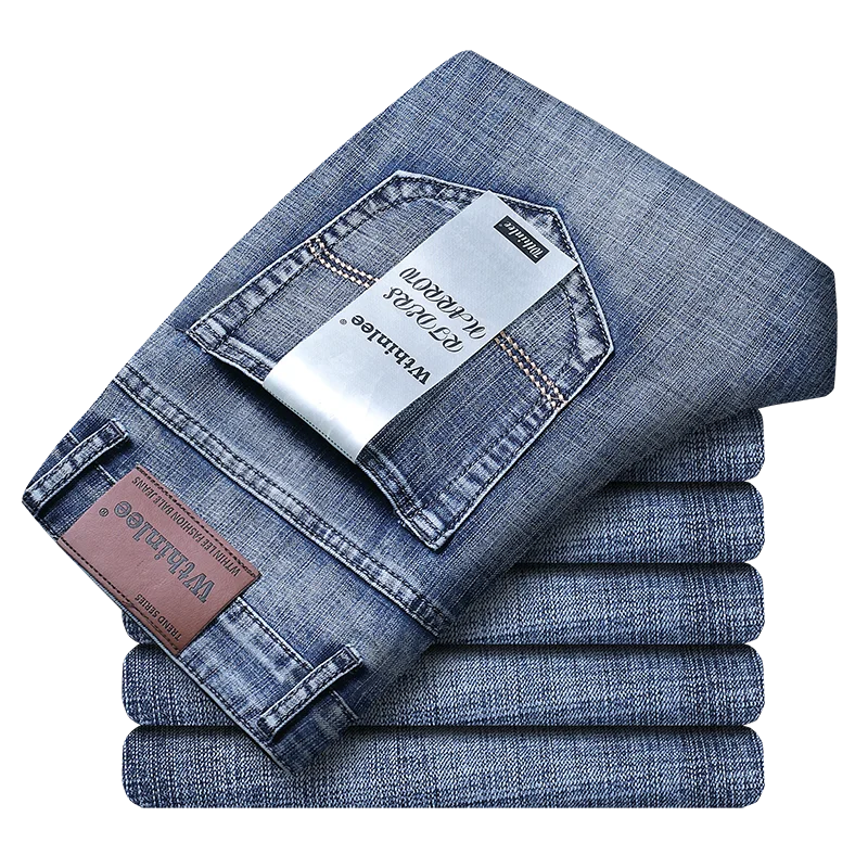 Light blue stretch business denim jeans folded to show clean tailoring for men's smart casual wear