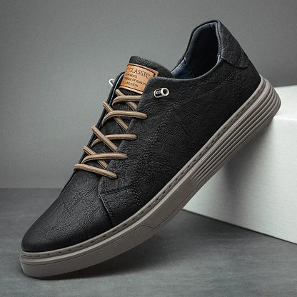 Men’s leather oxford sneakers in black with beige laces, side view on display stand