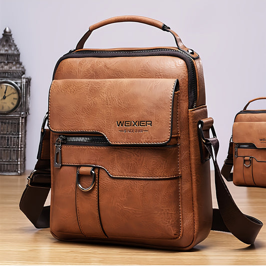 Men’s vintage crossbody shoulder bag in light tan, shown from front angle with zipper and handle