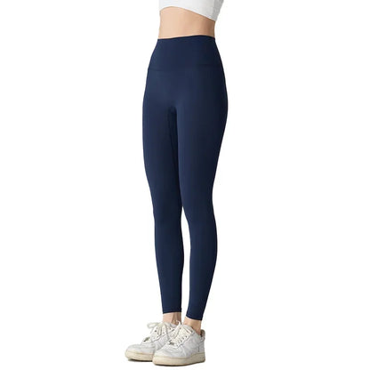 Model wearing navy blue high waist yoga leggings