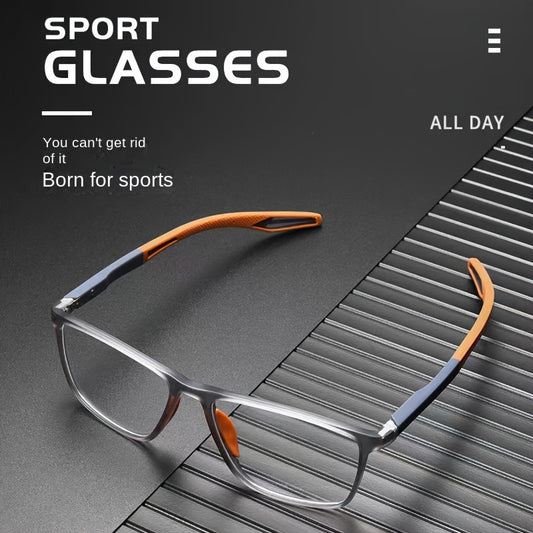 Sport reading glasses with smoky gray TR90 frame and orange temple tips on dark background