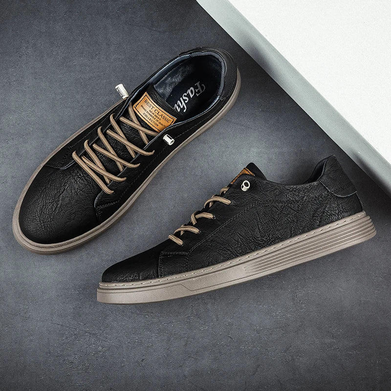 Taupe leather sneakers laid flat showing side profile and insole design