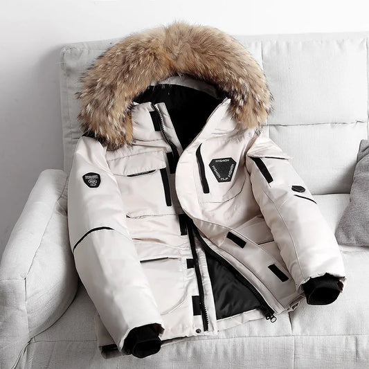 White men’s down parka jacket with fur hood, front view on sofa